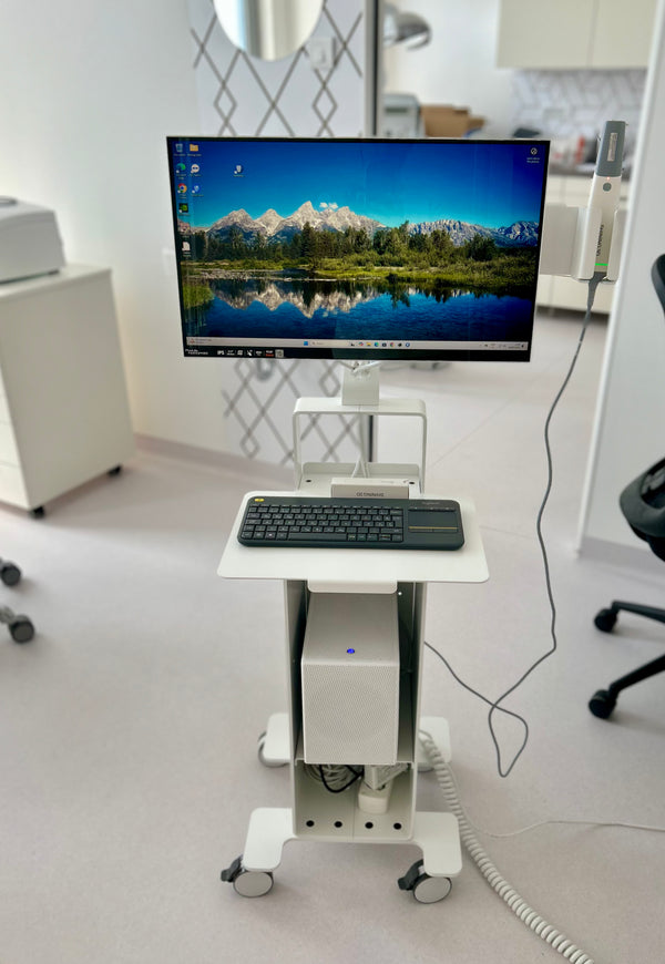 3DDS professional intraoral scanner cart with monitor and computer setup in a dental clinic