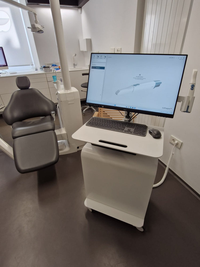 3DDS intraoral scanner cart with 3Shape TRIOS scanner and monitor in a dental clinic